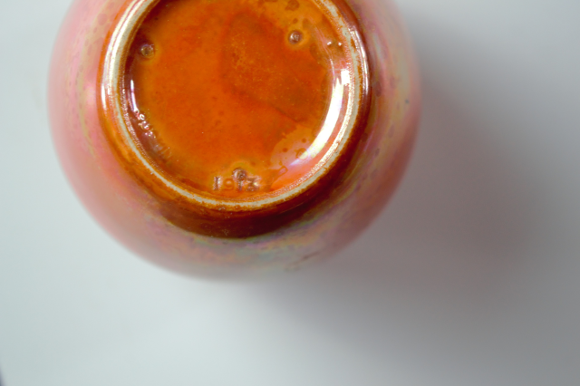 Ruskin Pottery Orange Lustre Ginger Jar.