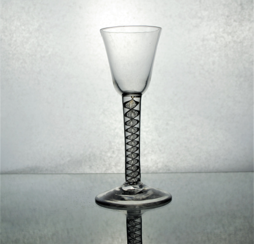 Georgian round funnel bowl opaque twist glass.