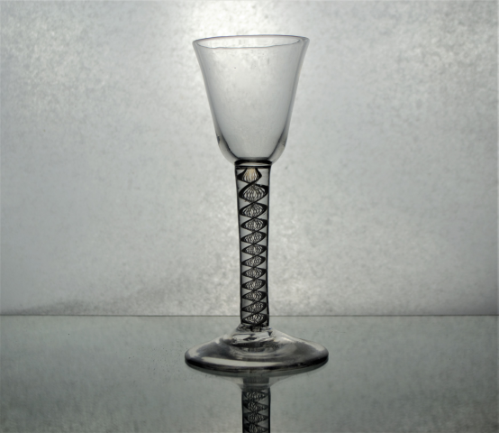Georgian round funnel bowl opaque twist glass.