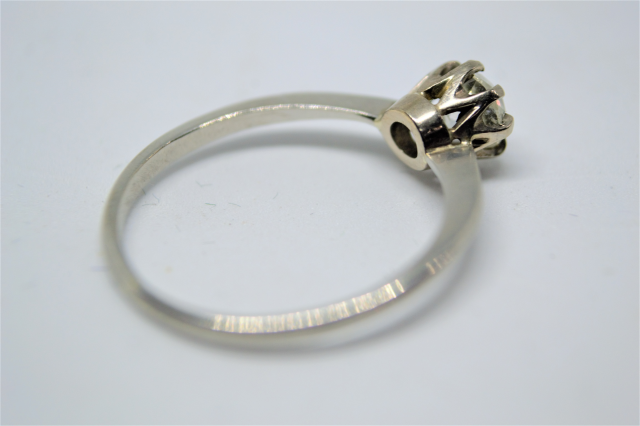 A Solitaire Diamond Platinum Ring.  