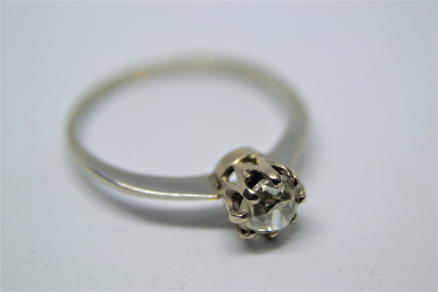 A Solitaire Diamond Platinum Ring.  