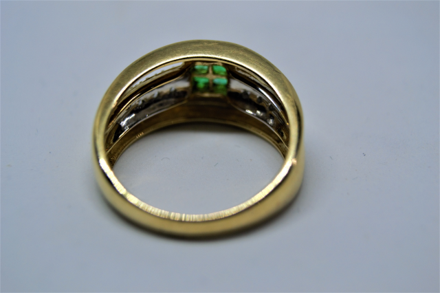 A 9ct Gold Emerald and Diamond Ring. 