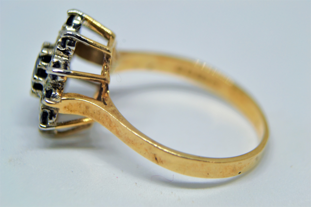A 9ct Gold With Sapphire And Diamond  Cluster Ring.