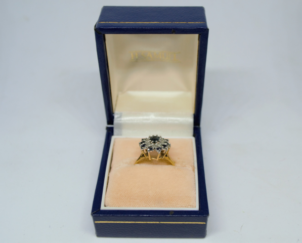 A 9ct Gold With Sapphire And Diamond  Cluster Ring.