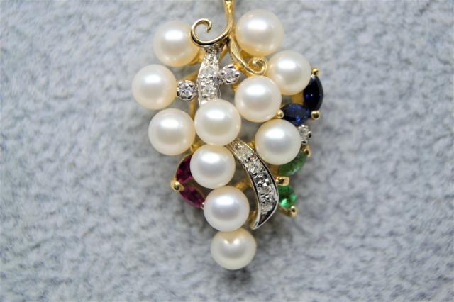 A 9ct Gold Cultured Pearl, Sapphire, Ruby And Diamond Pendant And 9 ct Chain.