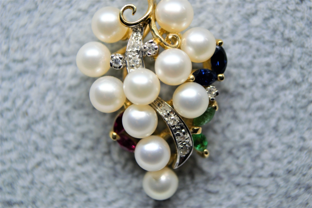 A 9ct Gold Cultured Pearl, Sapphire, Ruby And Diamond Pendant And 9 ct Chain.
