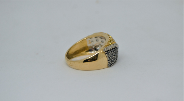 A 9ct Yellow Gold With White, Yellow and Black Diamond Dress Ring.
