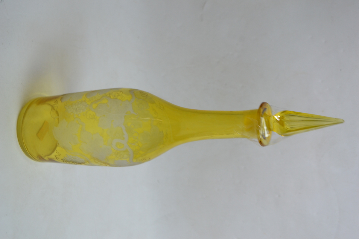 A 19th Century Continental Bottle Form Decanter Cased in Citron