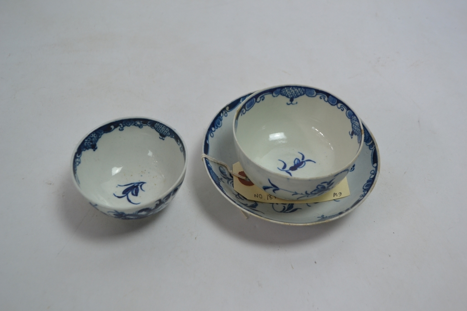 An 18th Century Worcester Underglaze Blue Teabowl and Saucer Decorated in the Mansfield Pattern,