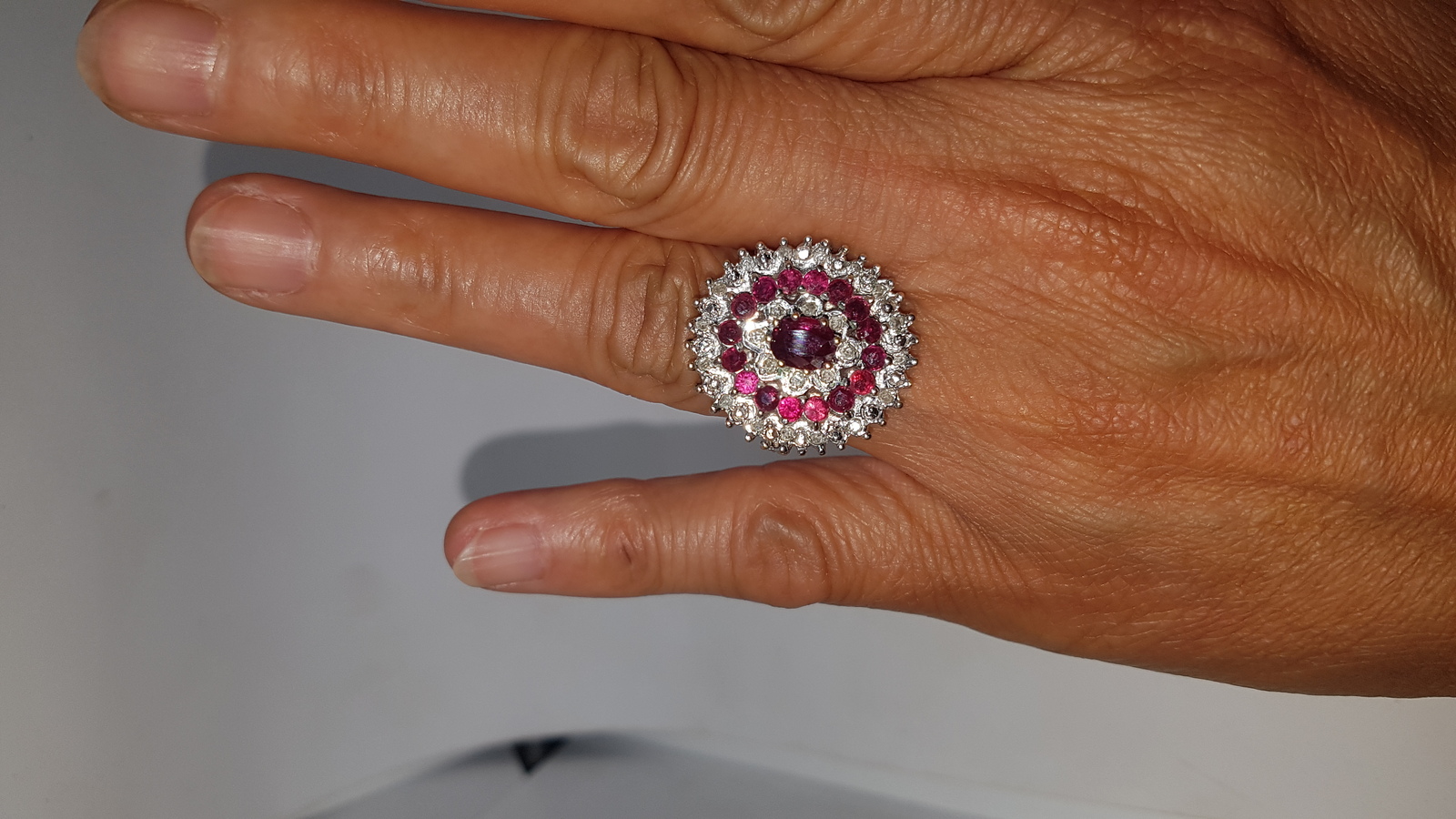 A 9ct Gold Ruby And Diamond Cluster Ring