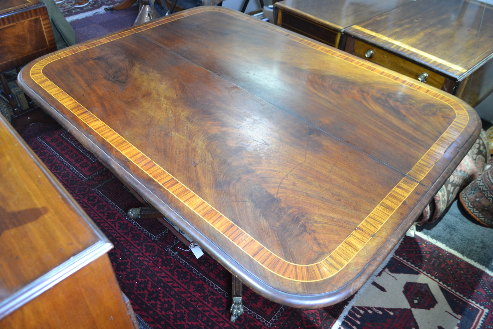 Regency Period flame Mahogany and satinwood banded breakfast table