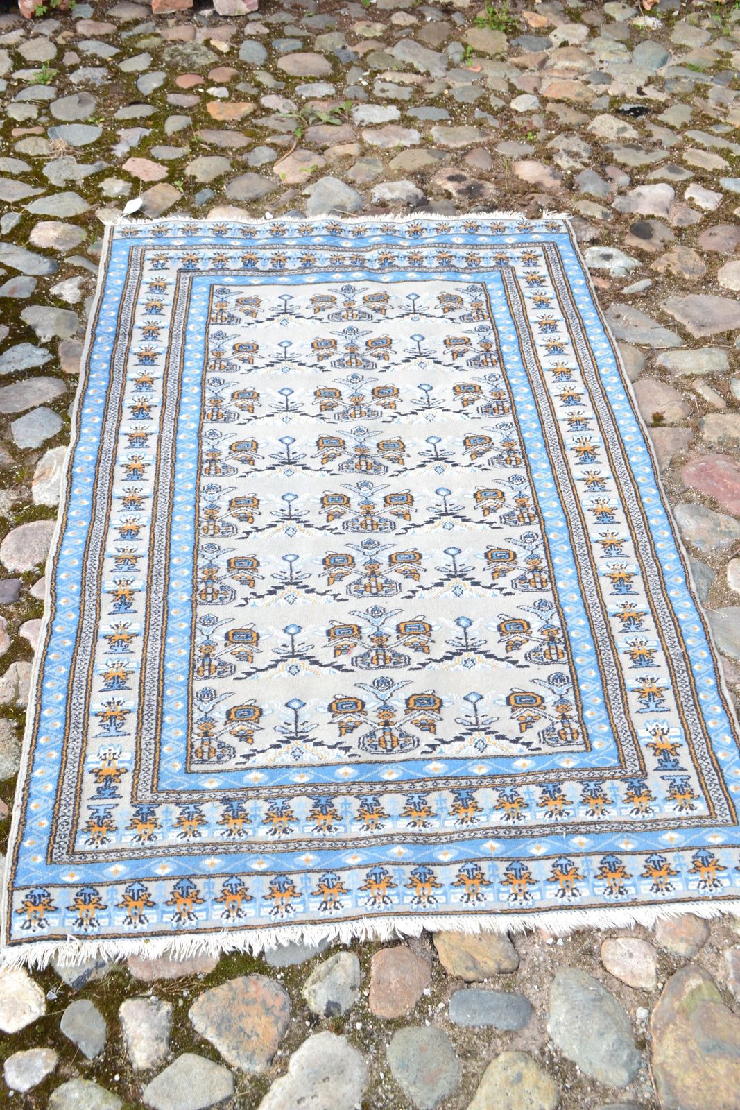 A Persian Pattern Rug, Blue Ground.