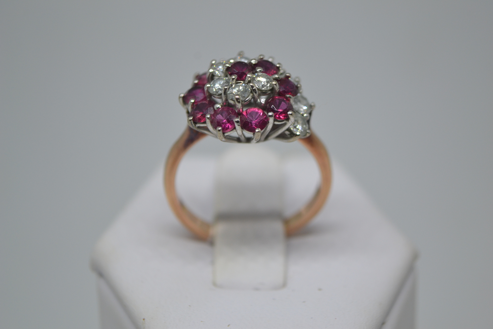 Mid 19thc. 9ct Gold Ring Swirl Set With Diamonds And Rubies.