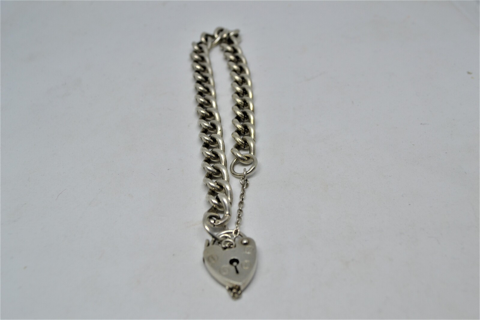 Solid Sterling Silver Curb Link Bracelet With Heart Padlock And Safety Chain.