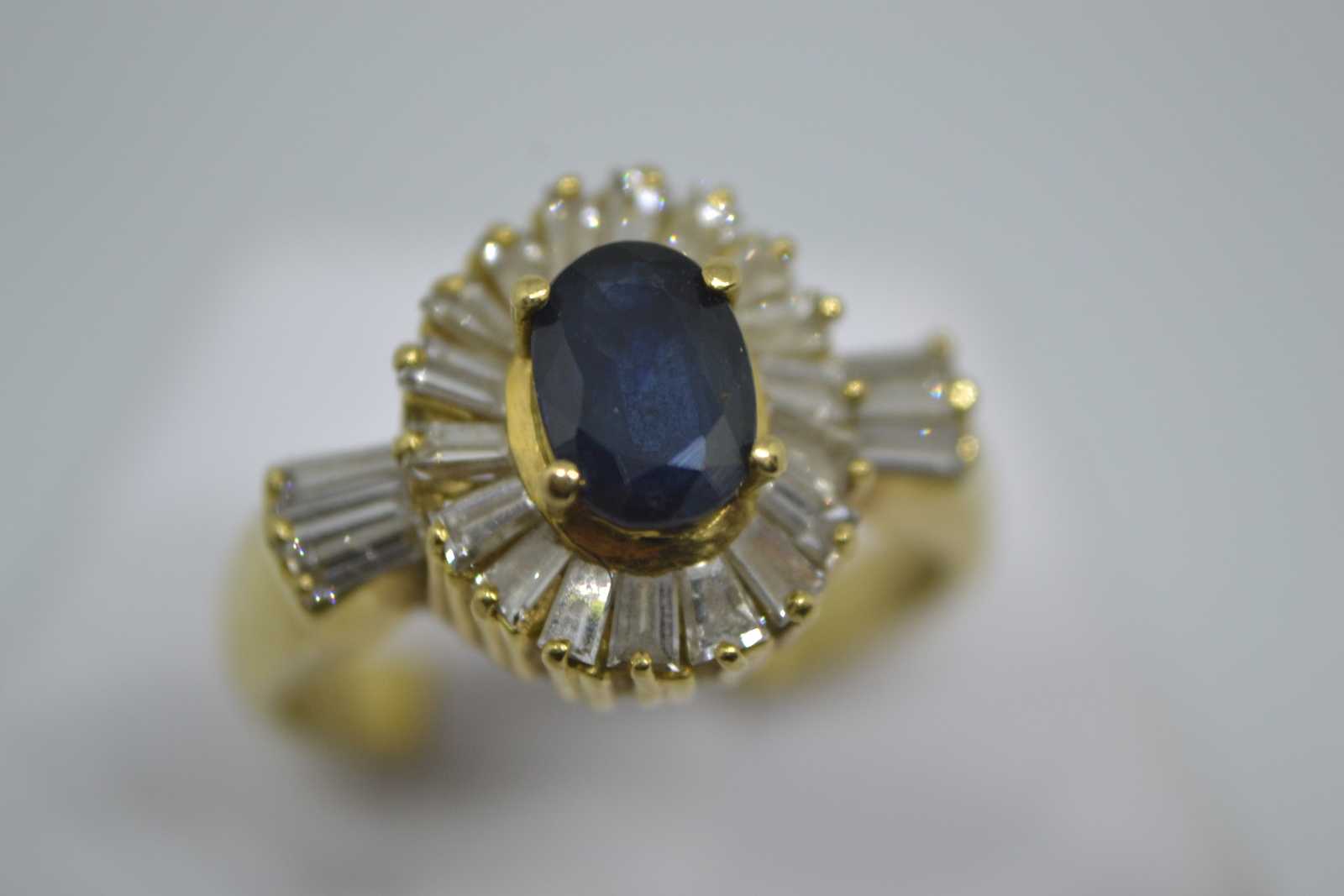 An 18ct yellow gold Sapphire and diamond ring