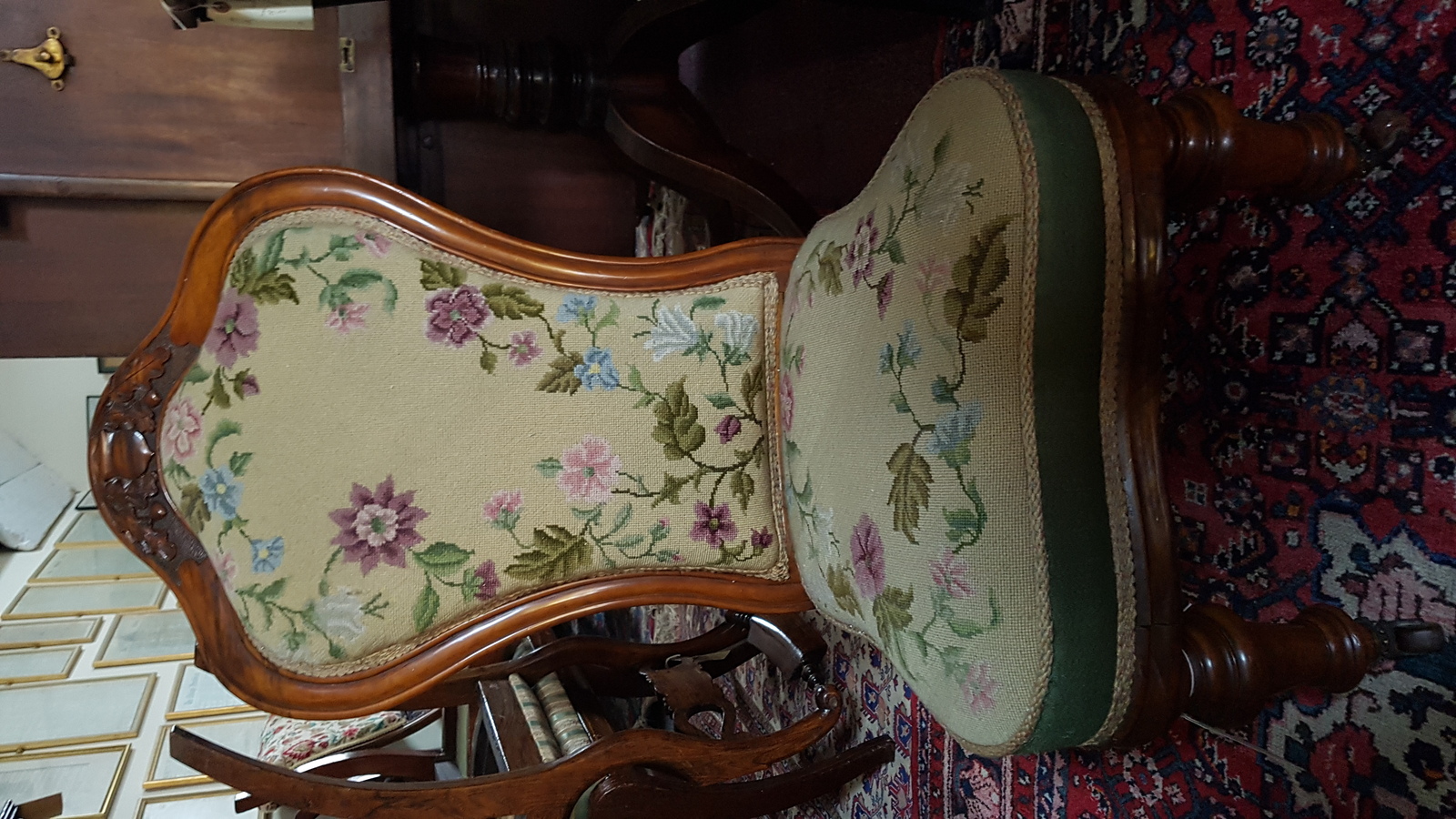 A Victorian Carved Walnut And Upholstered Nursing Chair