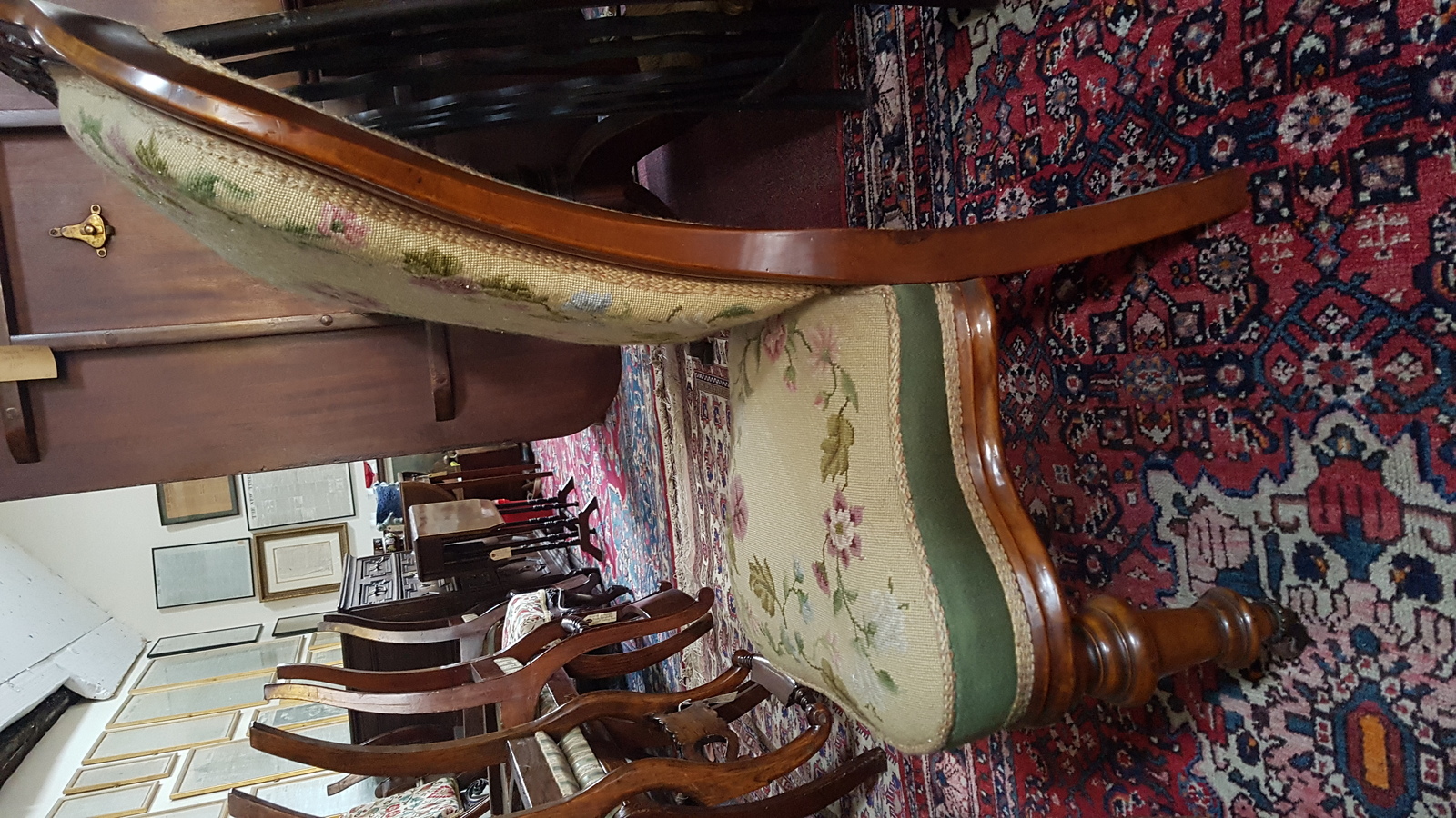 A Victorian Carved Walnut And Upholstered Nursing Chair