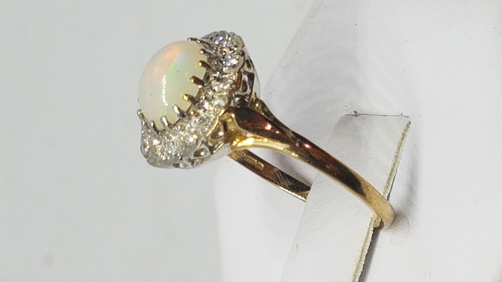 A 9 ct Gold Opal And Diamond Cluster Ring