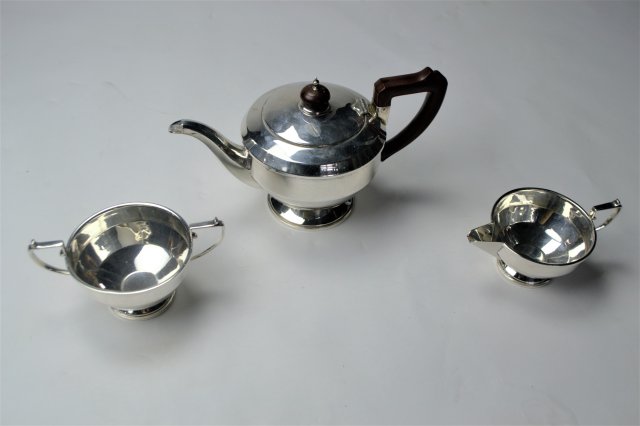 A Three Piece Silver Tea Service Set,