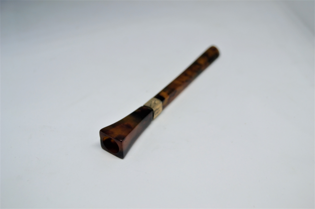 A Tortoise Shell Cigarette Holder With 9ct Gold Band.