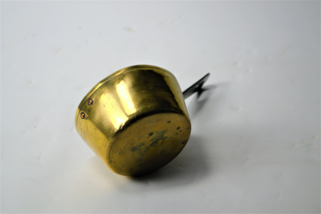 A Small Brass Pan With Long Handle
