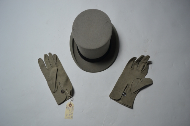Moss Brothers top hat with a pair of gloves